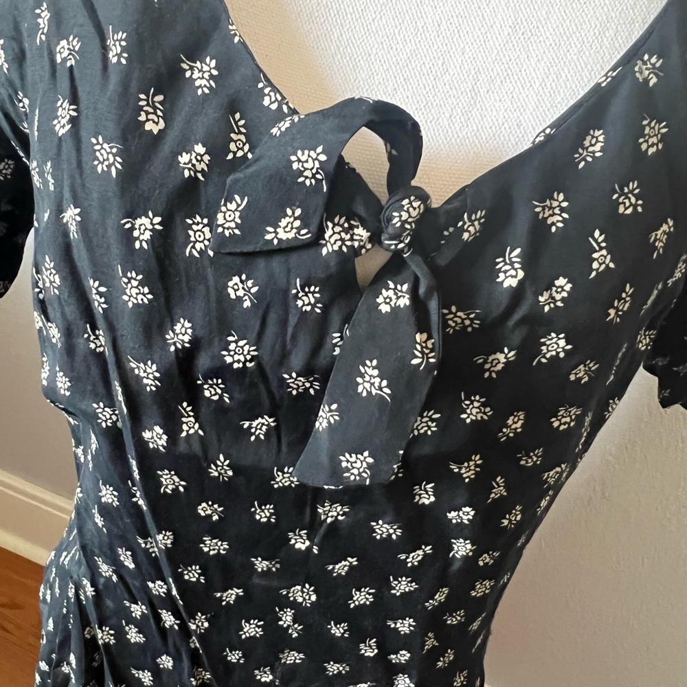 Bobbie B Designs Black Short Sleeve Romper with Small Cream Flowers w Tie - Picture 3 of 7